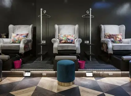 A Young LDN treatment room with three armchairs and a geometric floor